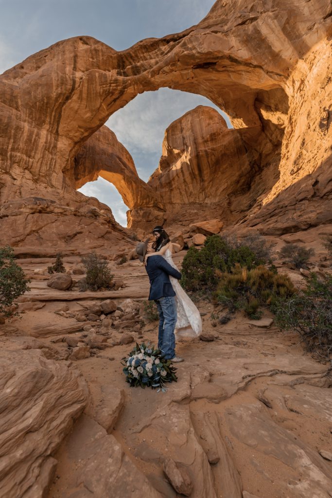 Elopement at double arch in Arches National Park Moab Utah