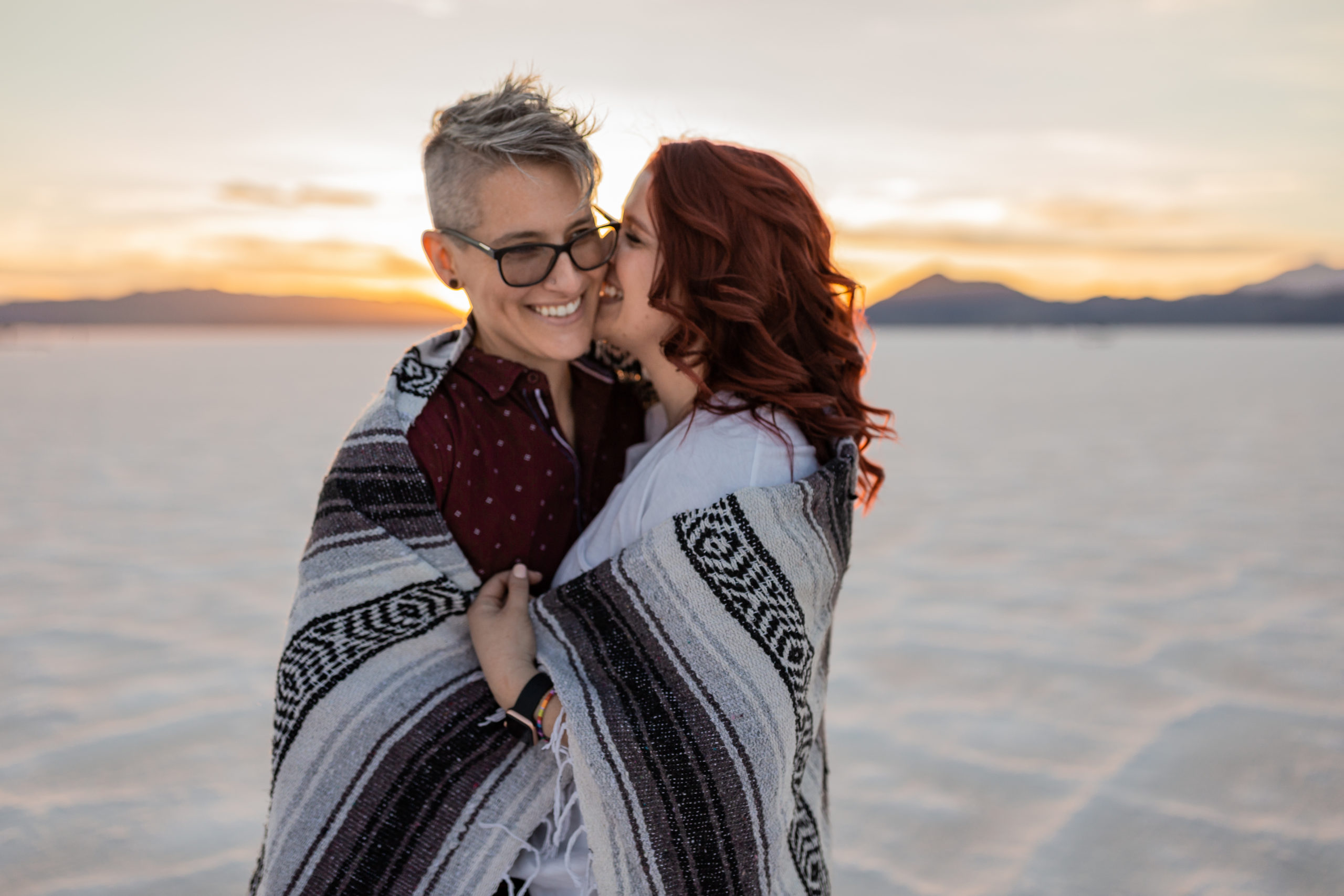 LGBTQ+ Bonneville Salt Flats Engagement Session at sunset in Utah