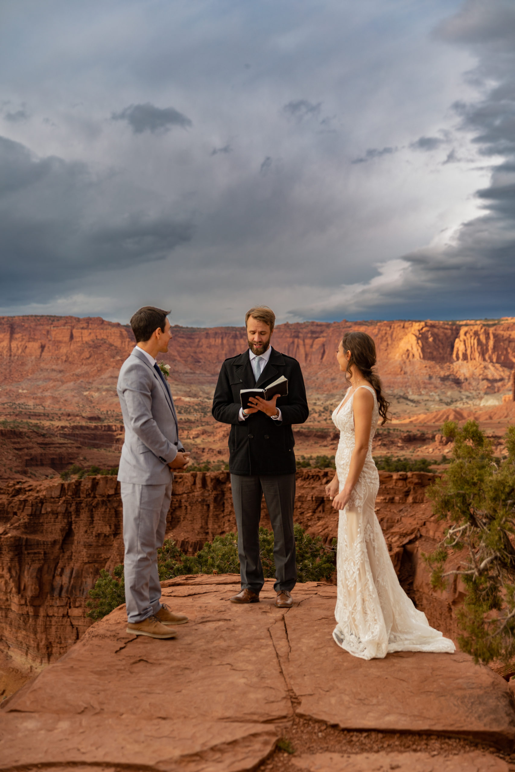 Wedding ceremony on overlook in Capitol Reef National Park in Utah
