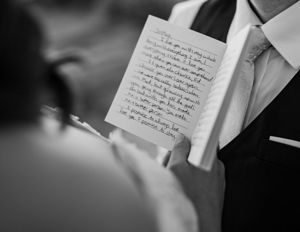 Close up of bride's vows in black and white